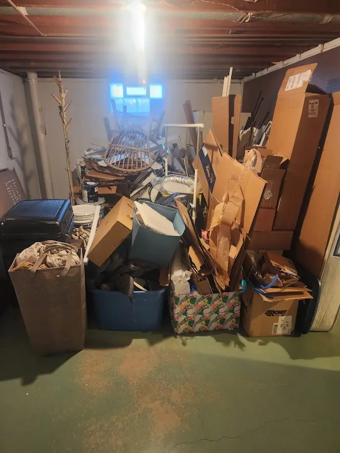 Roll-off dumpster container at job site for 4 Yard Dumpster Rental in Emmetsburg